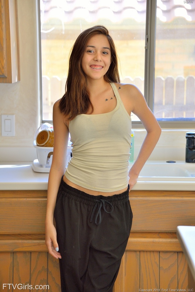 Puffy nipple teen Sophia spreading and inserting her toy in the kitchen